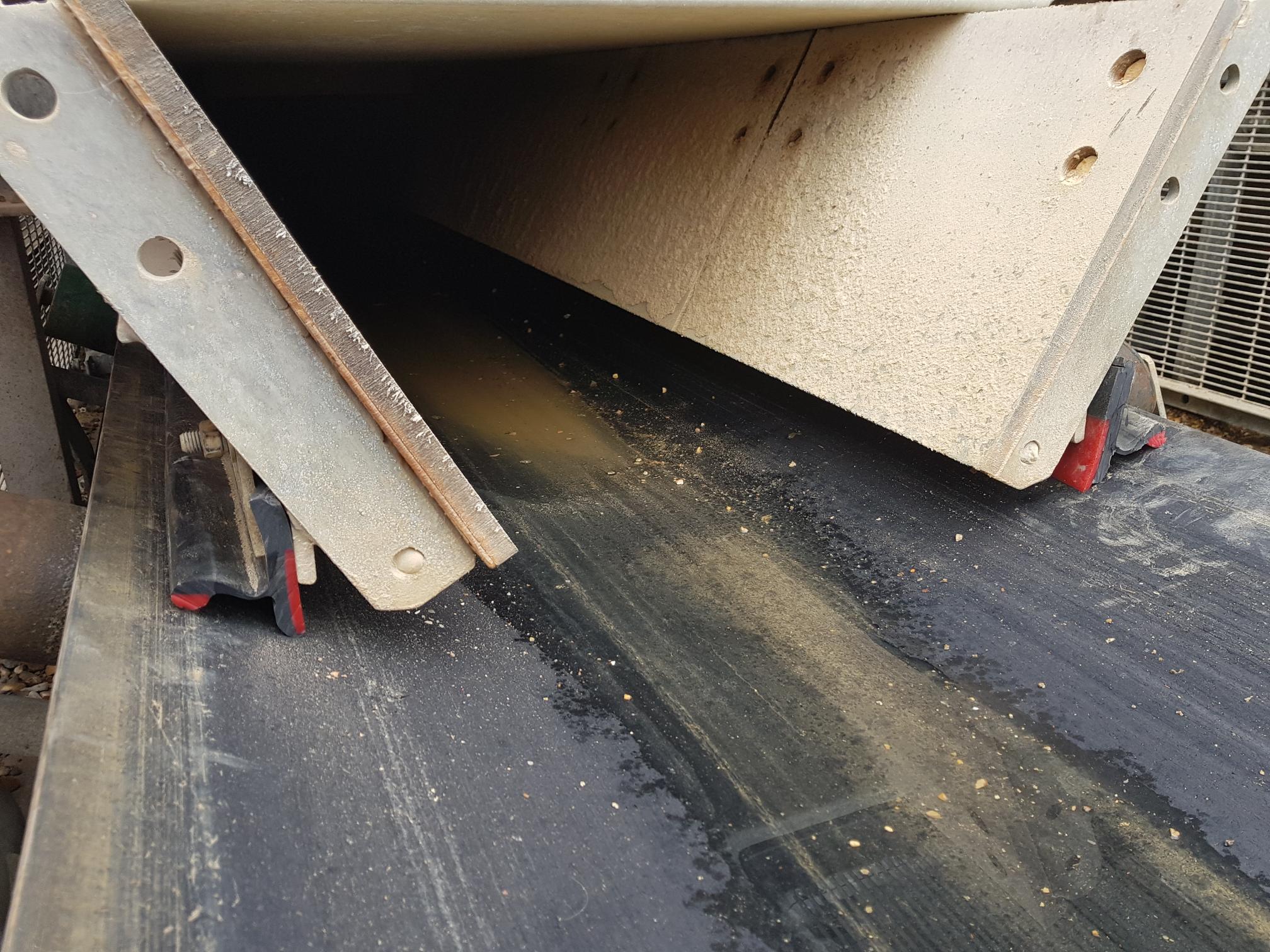 conveyor belt scraping